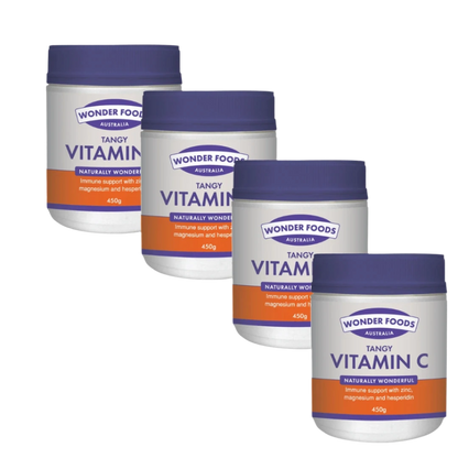 Four containers of Wonder Foods Tangy Vitamin C on a white background